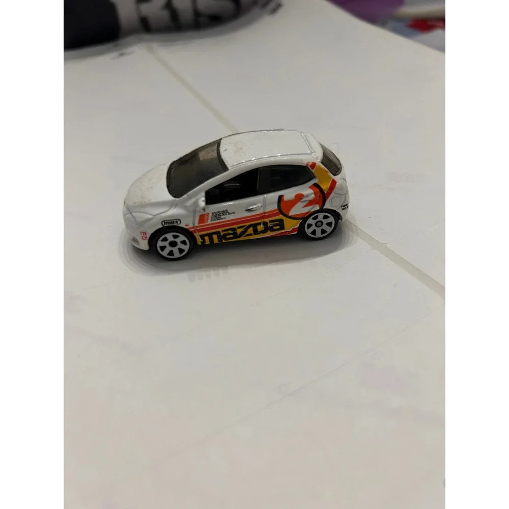 Matchbox 2008 Mazda 2 White Racing Graphics Diecast Car 1:64 Mattel M8762